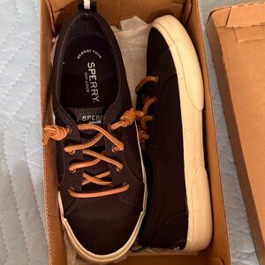 Sperry women’s Black and Tan Sneakers